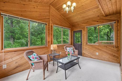 The four season porch extends into the .63 acres of wonder. In Dec., there were 3 deer gently grazing in the backyard.