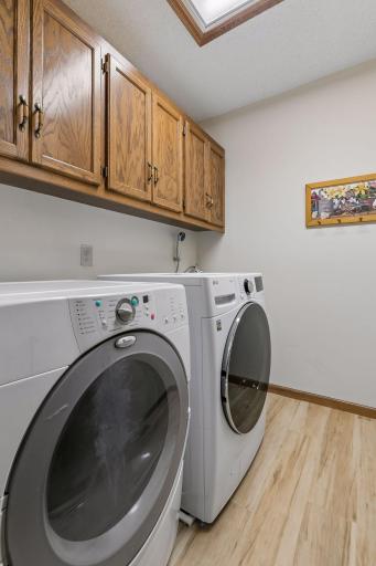 Fresh laundry room off the hallway on the main level