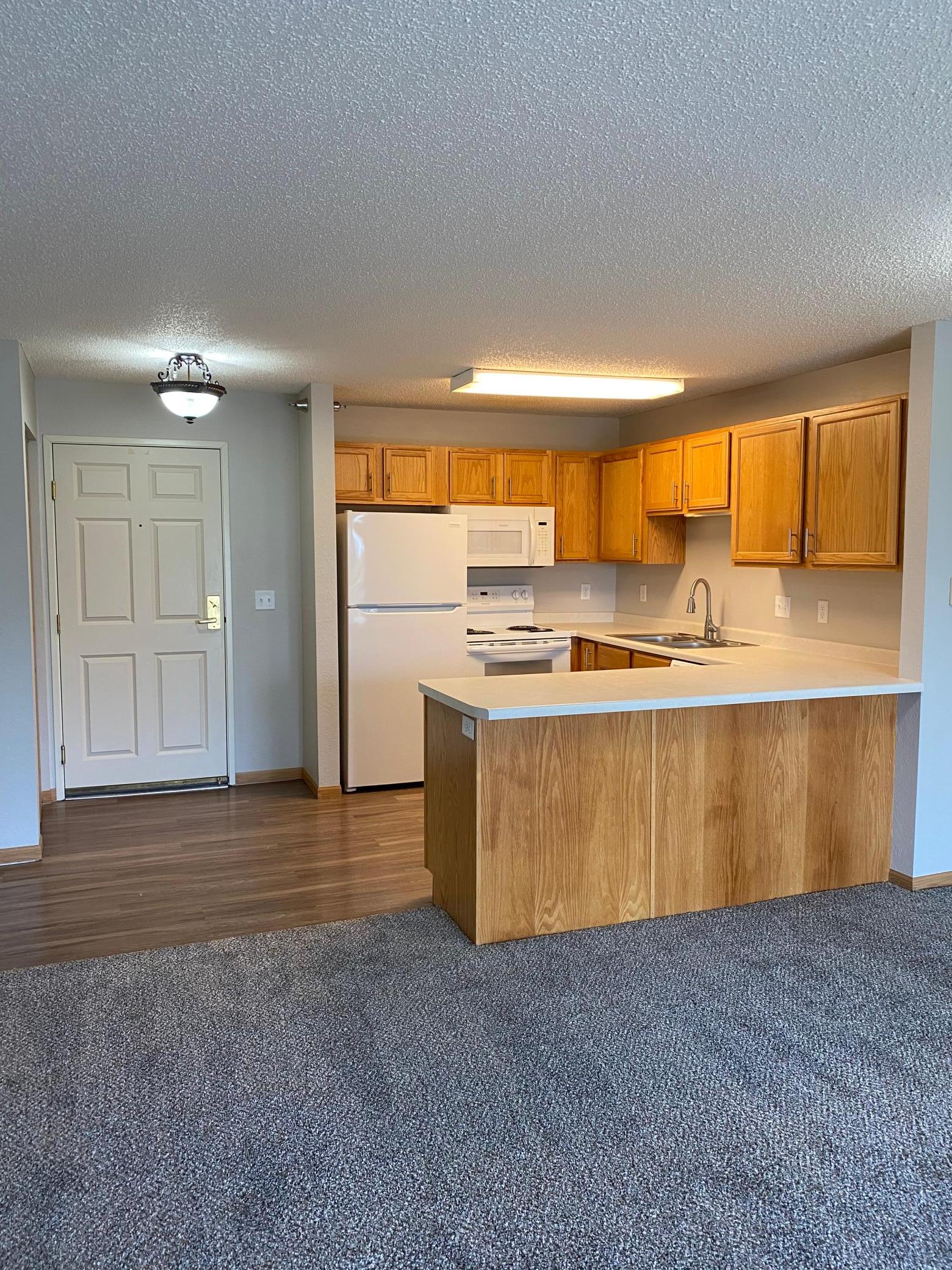 Similar Unit Picture, this one has white kitchen cabinets, pictures are coming soon!