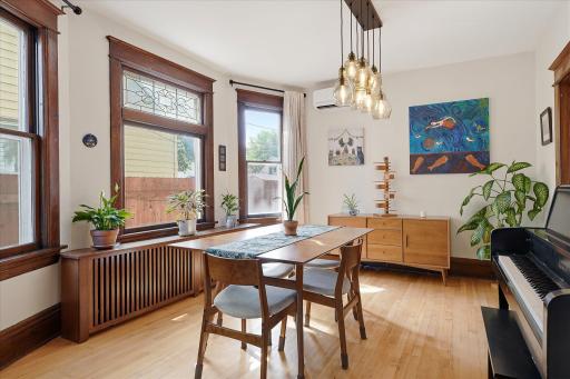 Sunny & large dining room, with another custom radiator cover, which is a happy place for your plants!