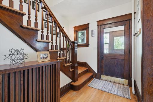 Original door & leaded glass window looking out to the front porch.