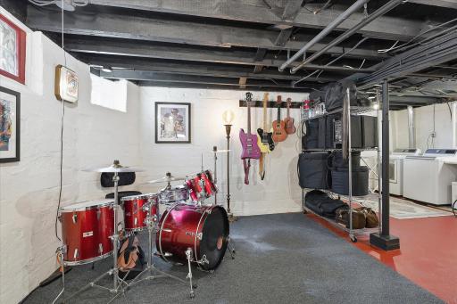 Basement features glass block windows & all spaces floor to ceiling have been cleaned & painted.