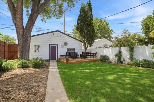 Backyard is a nice combination of garden, grass & low maintenance mulch areas.