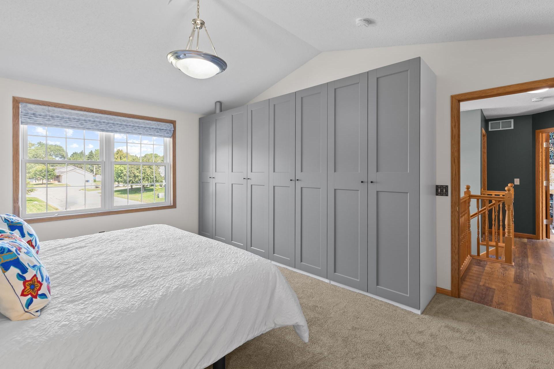 The primary also features this wall of closets, which are included in the sale.