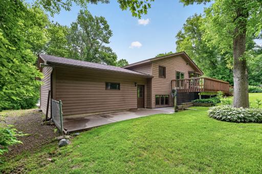 Extra parking next to the garage for the trailer, boat or camper and an additional patio too