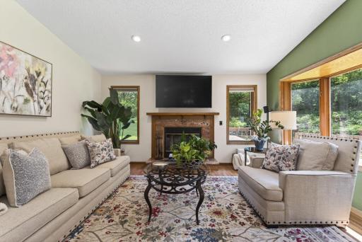 Sit in your living room admiring your view of the private lot and pond
