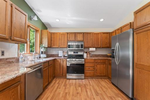 Wonderful cabinet space in this kitchen along with more beautiful pink granite