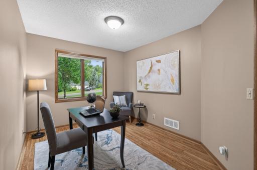 The 2nd upper level bedroom works well as a bedroom or office space
