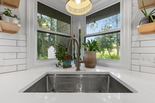 Kitchen sink with backyard view