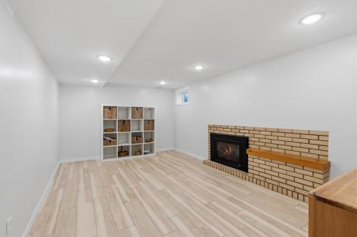 Flex Room - Gas fireplace with brick surround