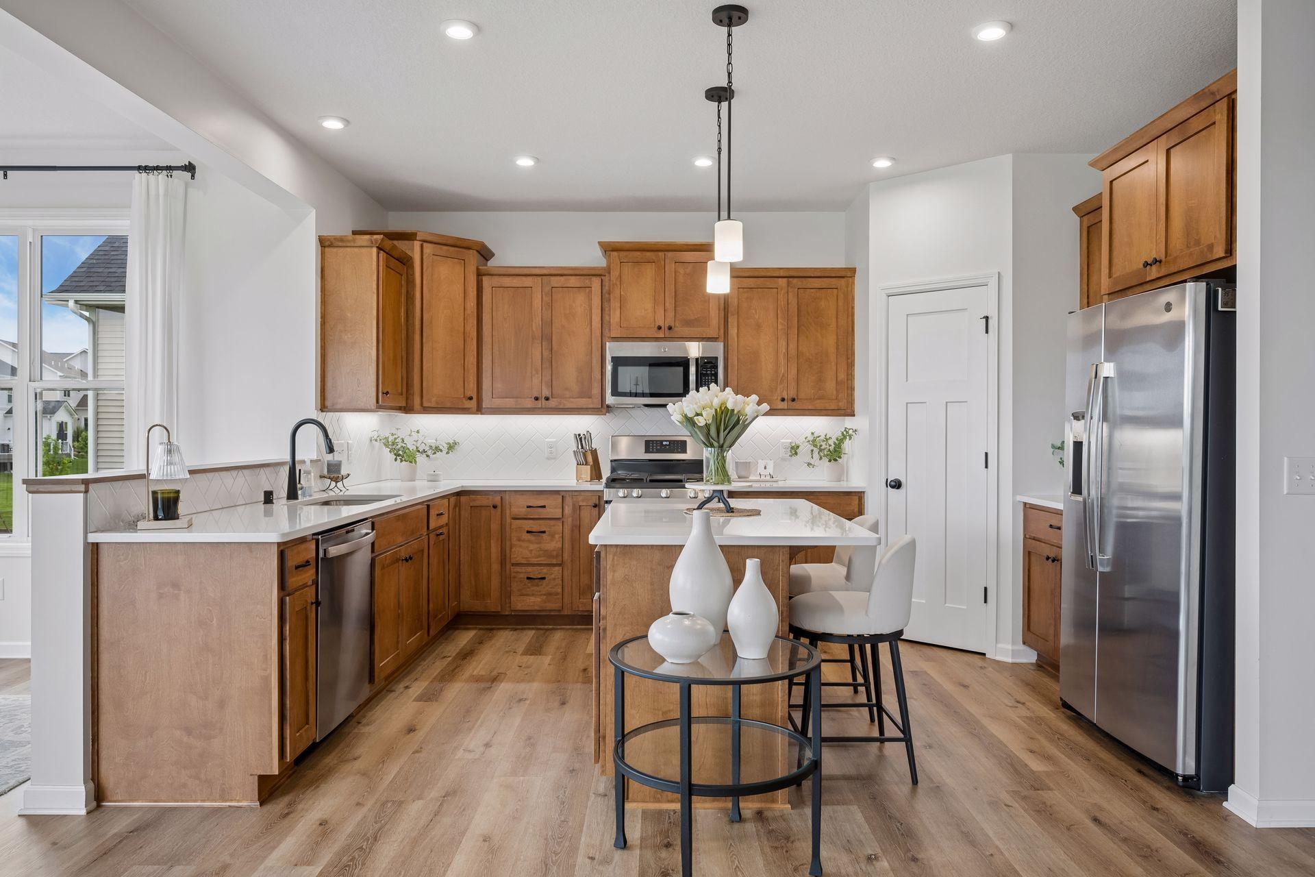 Kitchen w/ Center Island & Stainless Appliances