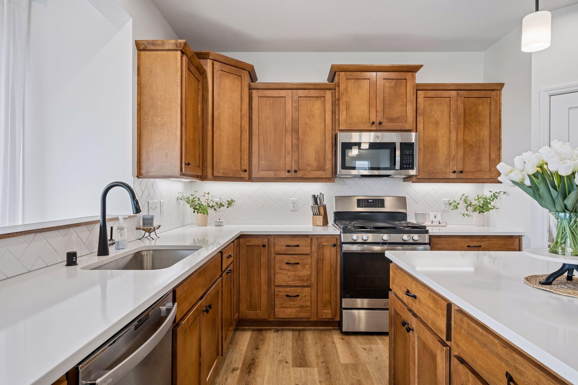 Kitchen w/ Center Island & Stainless Appliances