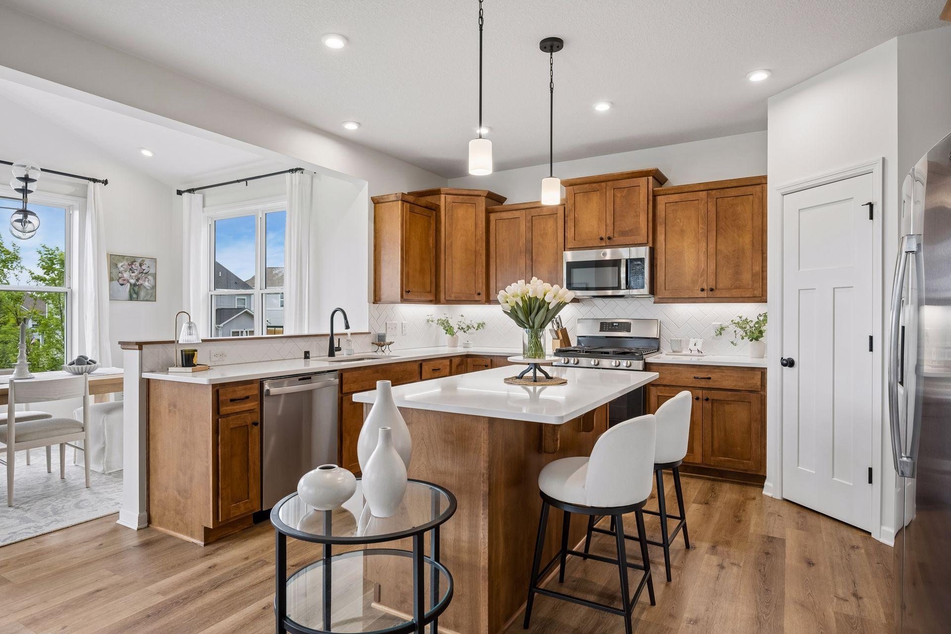 Kitchen w/ Center Island & Stainless Appliances
