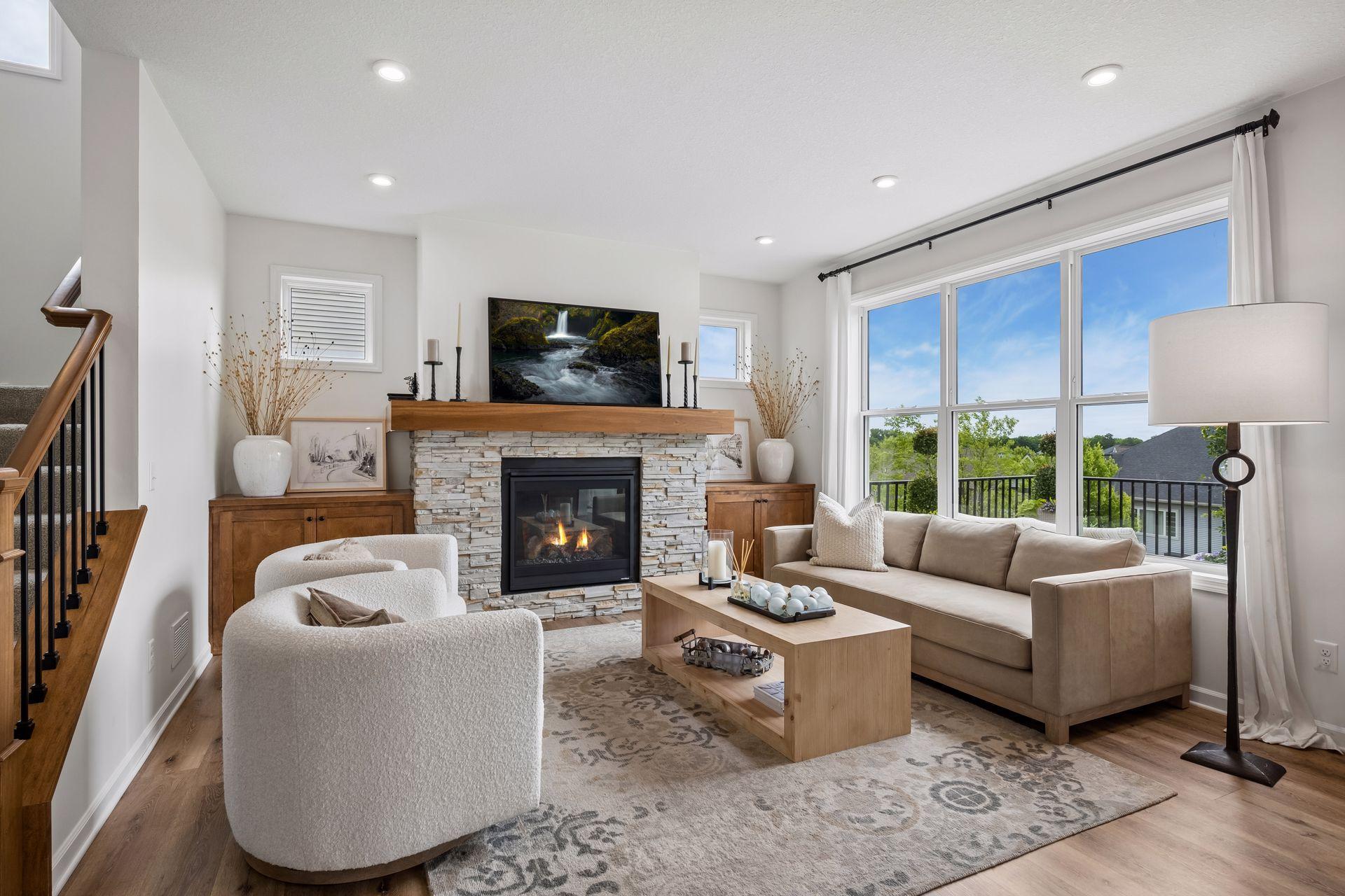 Living Room w/ Fireplace, Stone Surround, Built-ins and Huge Windows
