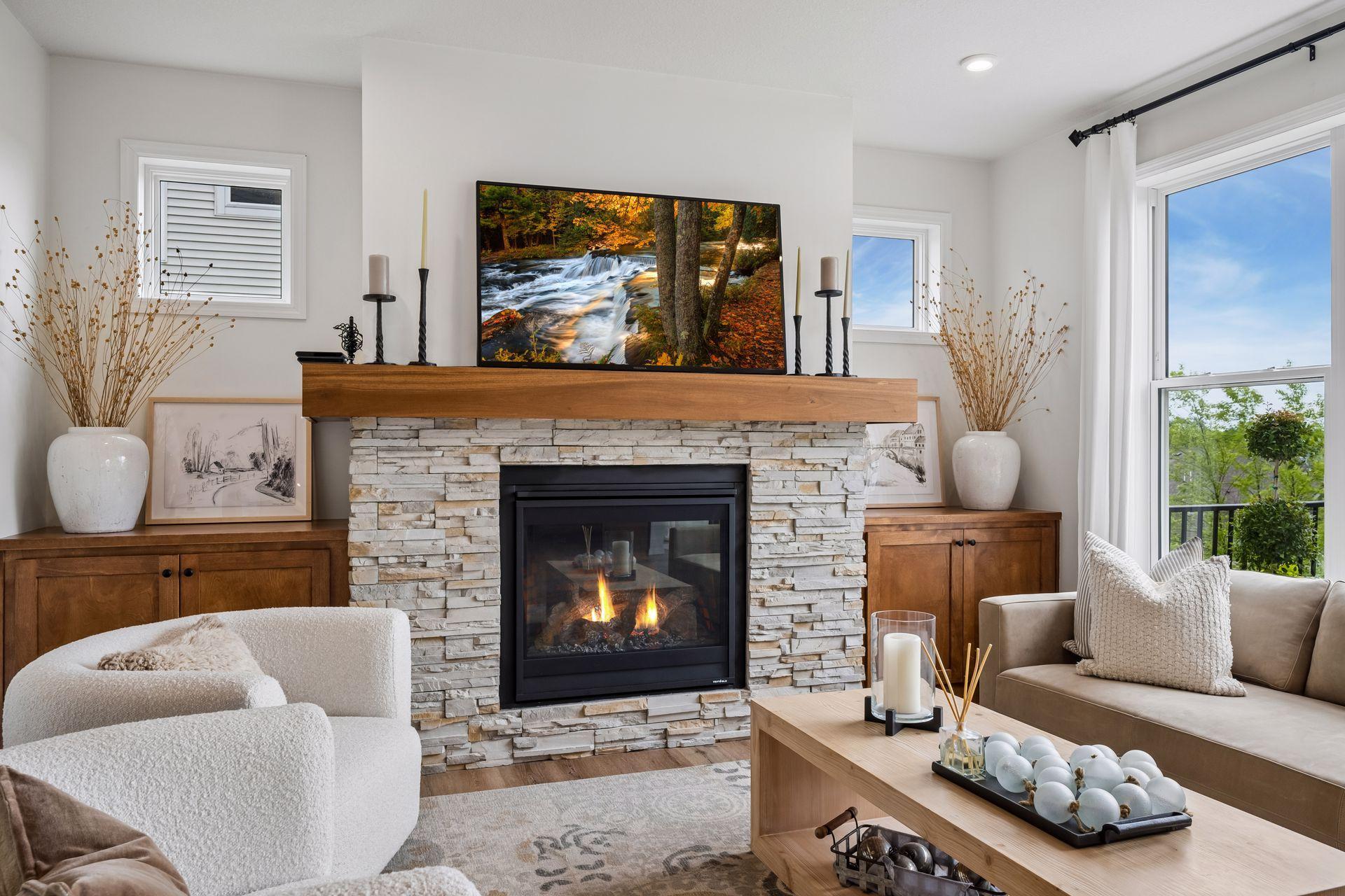 Living Room w/ Fireplace, Stone Surround, Built-ins and Huge Windows