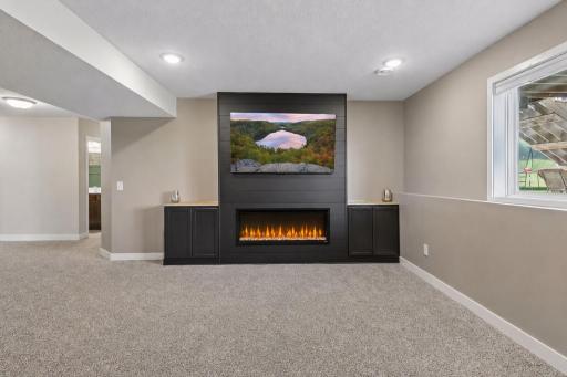 Family Room w/ Fireplace & New Carpet - Lower Level