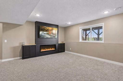 Family Room w/ Fireplace & New Carpet - Lower Level