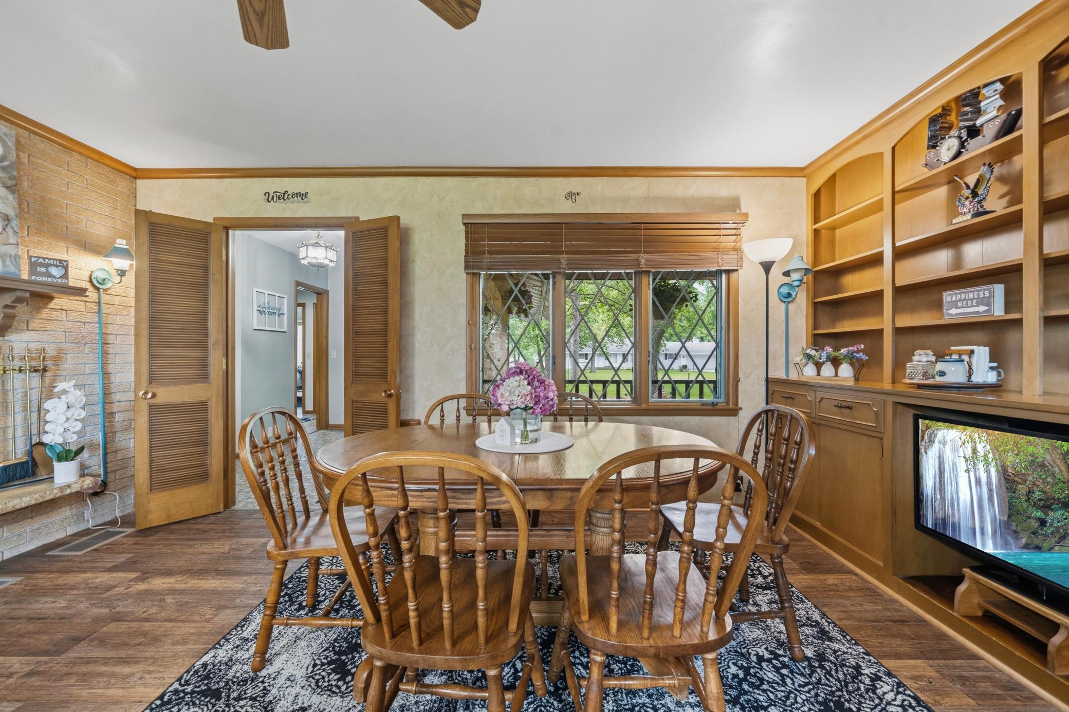 Dining Room is large enough to hold a much bigger table to fit 10 I would say....JPG
