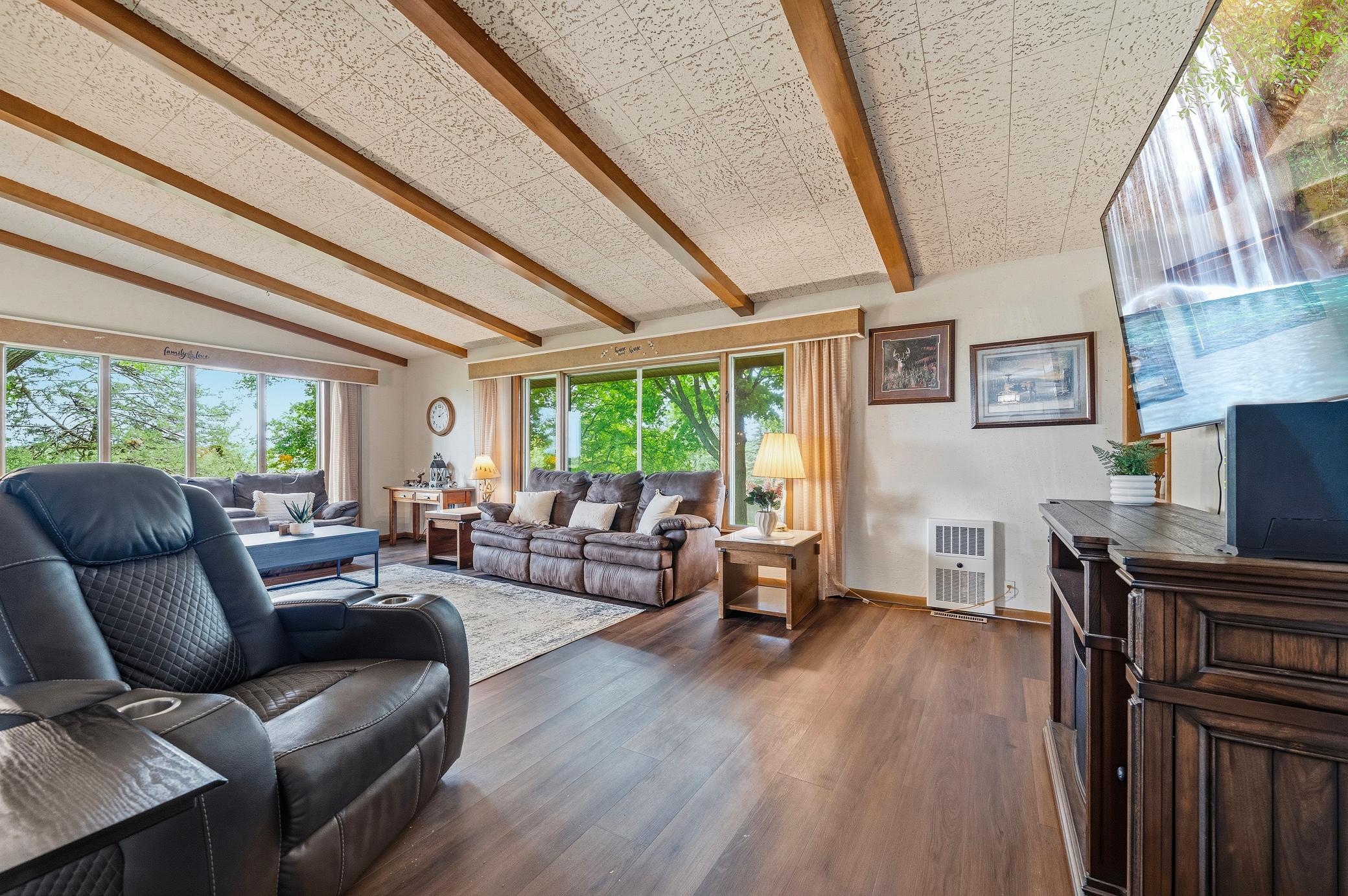 There is plenty of Space to Relax in this Main floor Living Room.JPG