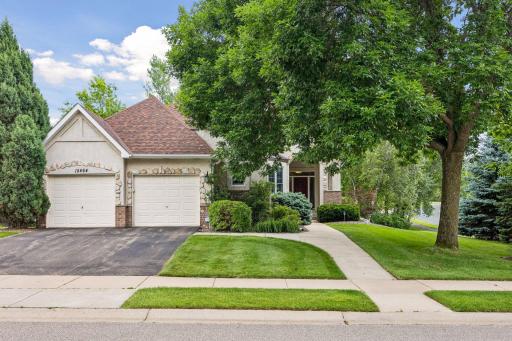 Stunning Exterior Home Details From Stone and Brick Accents to Archways - Curb Appeal is Here!