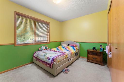 Secondary bedroom on main level with freshly painted.