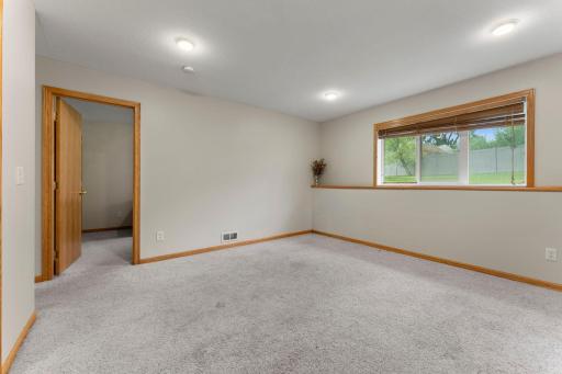 Another angle of lower level family room. All freshly painted.