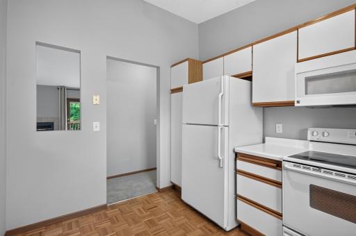 Ample kitchen storage with deep cabinetry.
