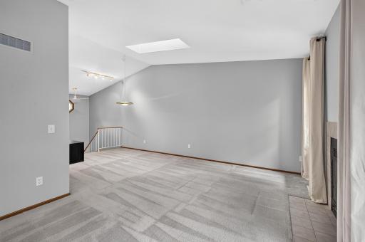 Spacious open-concept living and dining area.