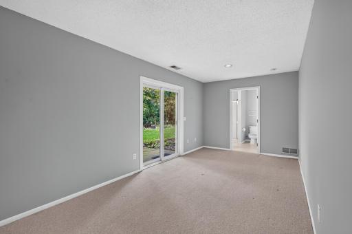 Versatile lower-level space with walkout access to backyard.
