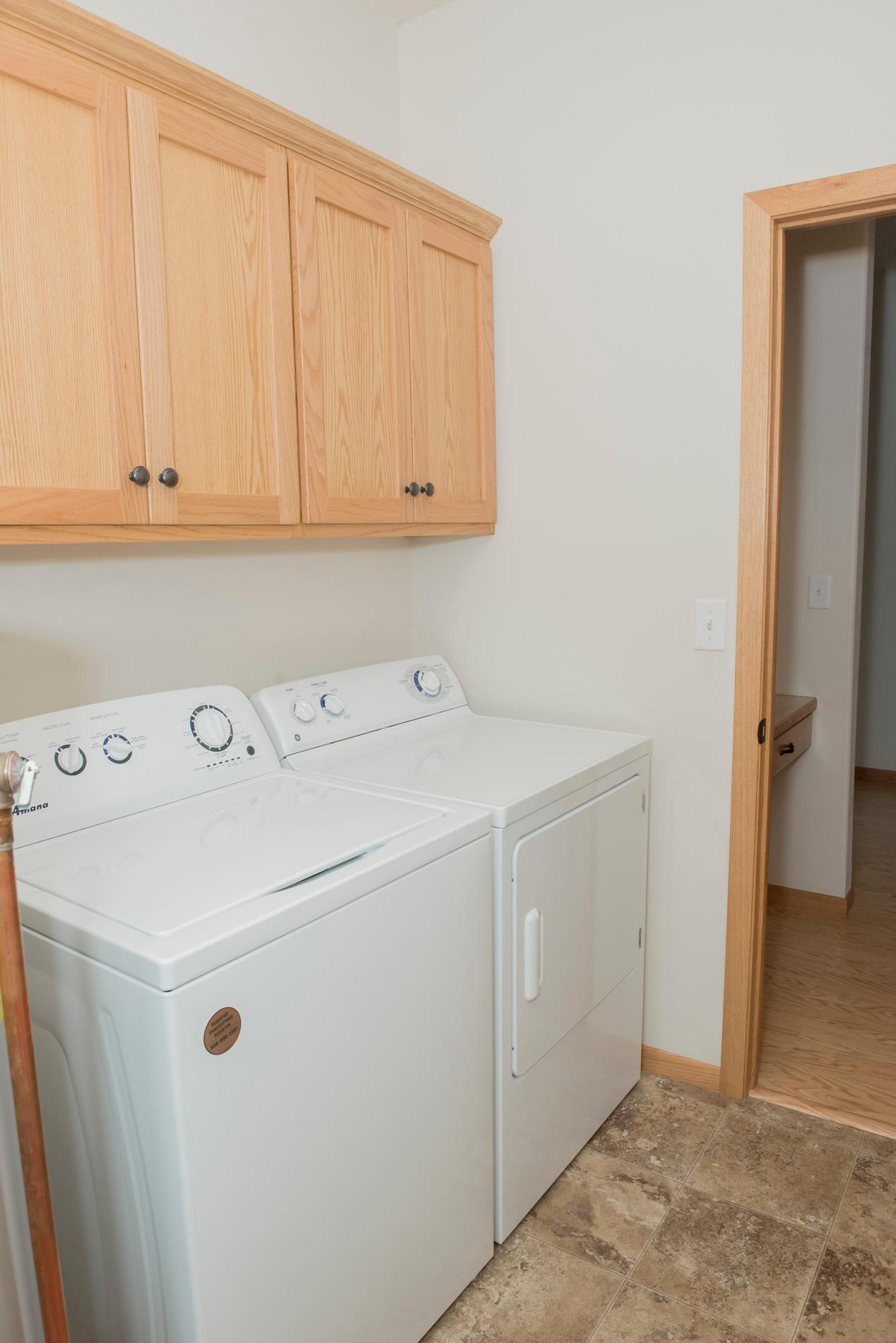 Laundry with cabinets