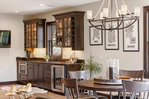 Fully equipped wet bar with microwave and wine cooler.