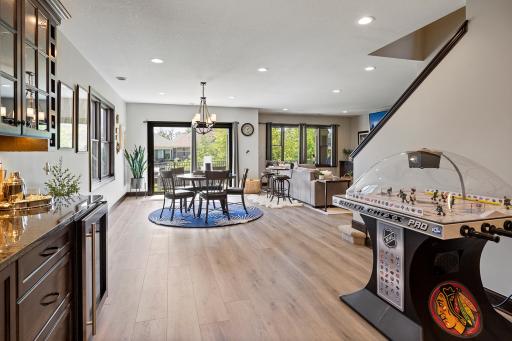 The walkout lower level offers the scale, craftsmanship, and natural light typically reserved for the main floor.