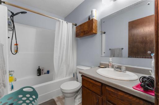 The full bathroom features a tub and shower combination conveniently located near all upper-level living spaces.