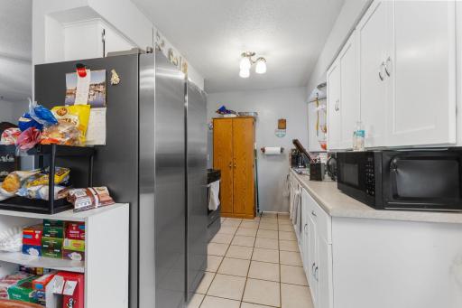 Stainless steel appliances create a clean, cohesive look that is easy to maintain.