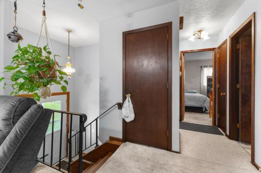 The split-entry layout offers two bedrooms on the upper level and two bedrooms downstairs.