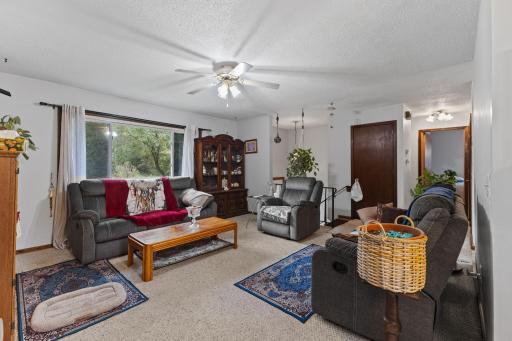Complete with a ceiling fan for added comfort year round.
