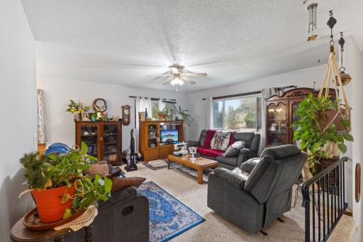 Large windows bring scenic outdoor views into the main living area.