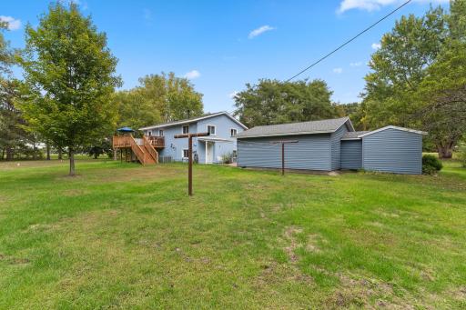A detached garage and additional outbuildings offer valuable room for vehicles, equipment and storage.