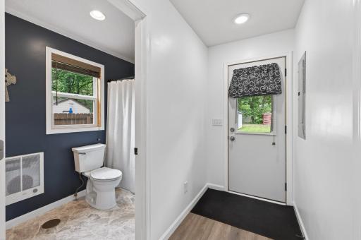 Full bathroom and easy access to the backyard.