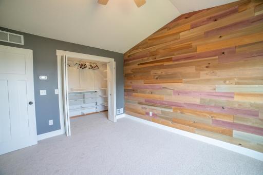 Primary suite with vaulted ceilings