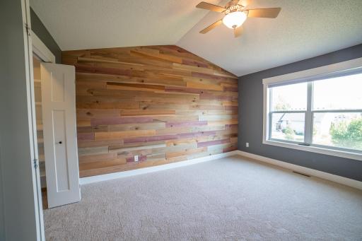 Primary suite with vaulted ceilings