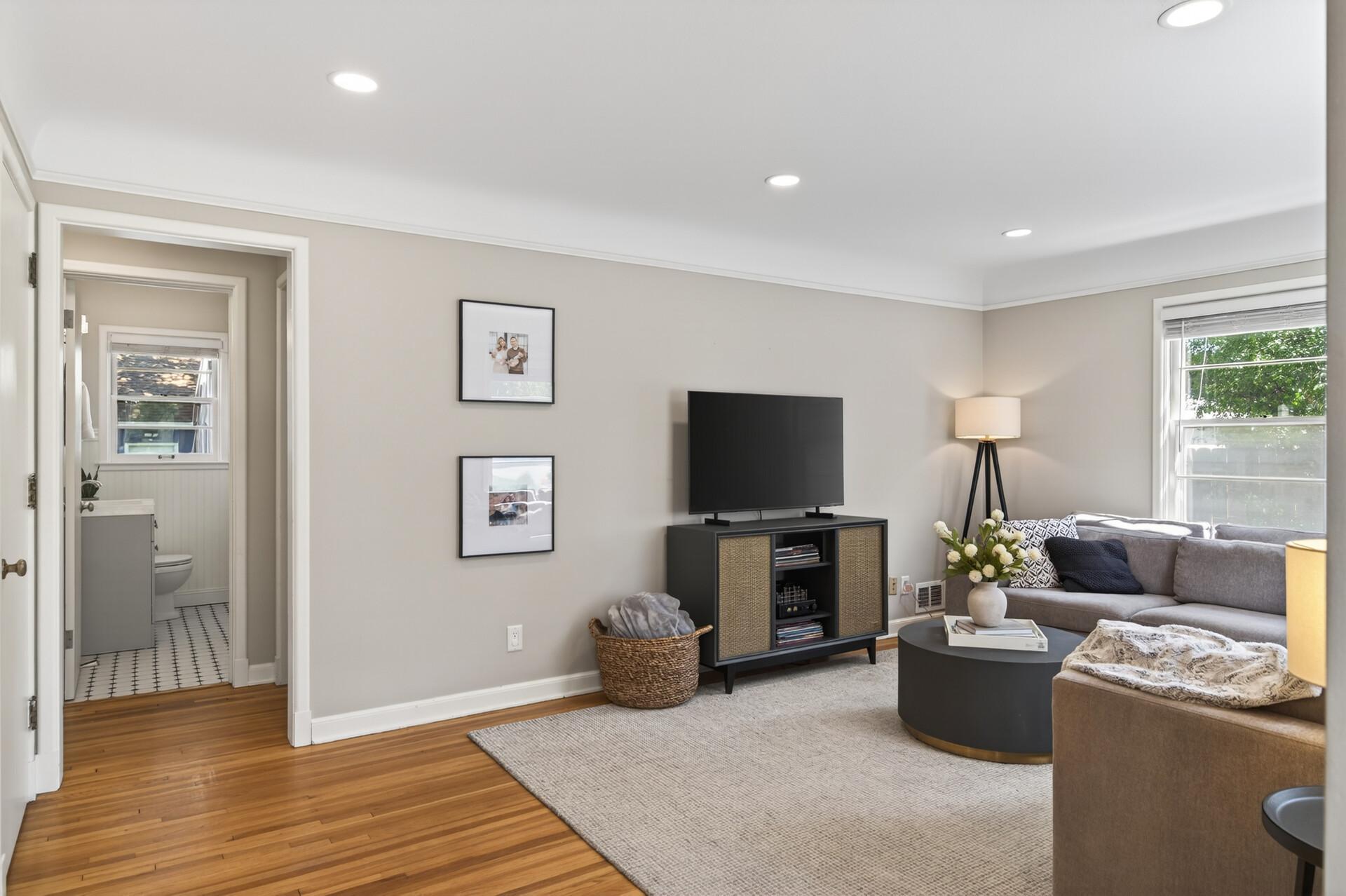 Main Level Living Room with beautiful Hardwood Floors