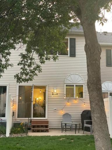Enjoy the patio while overlooking green space and has privacy fencing on each side