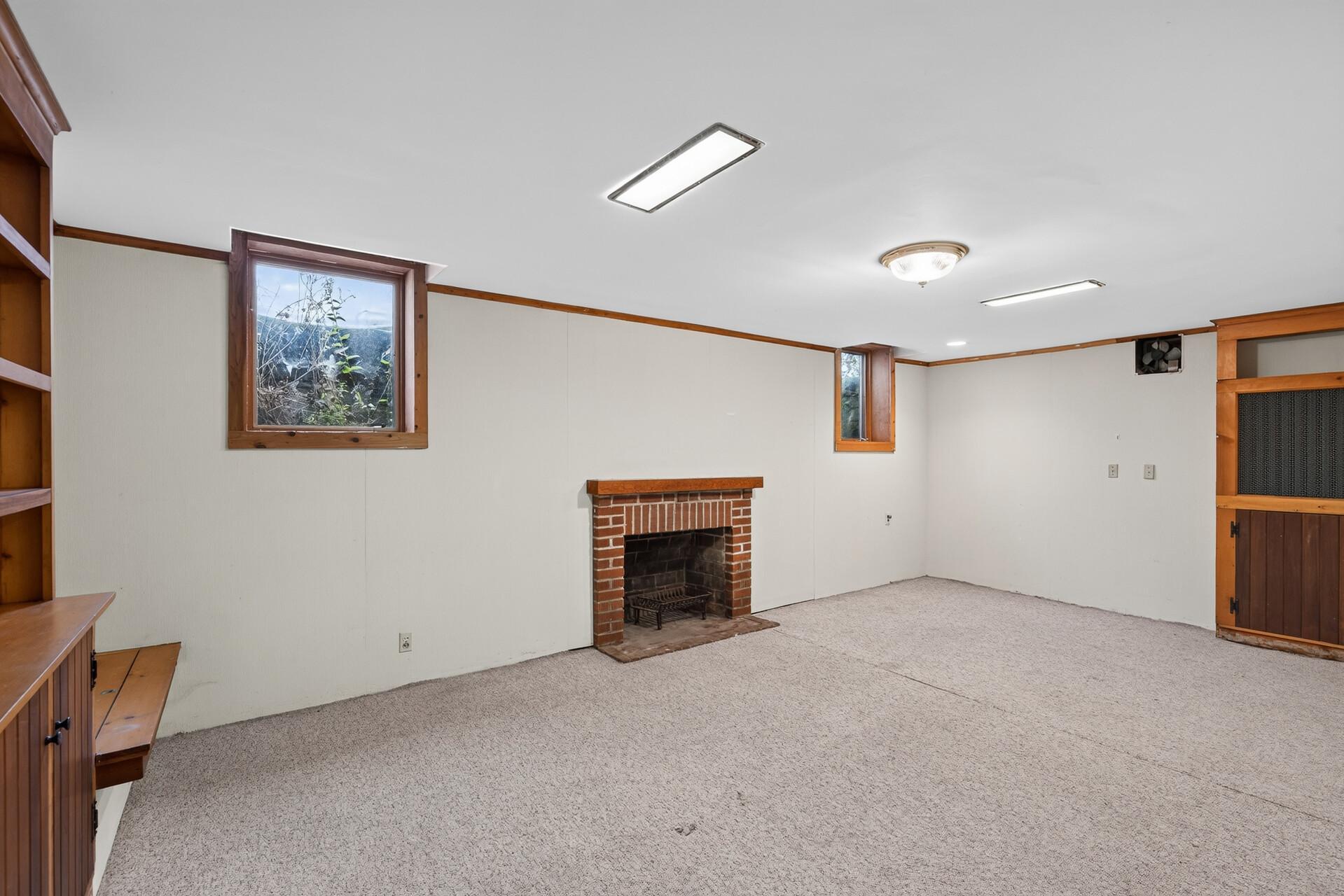 Basement family room with fireplace