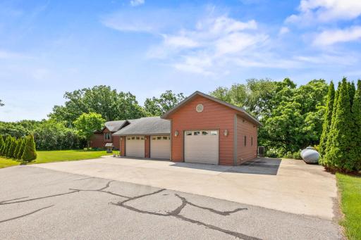 Large 3 car garage. 3rd stall has a car lift in it!