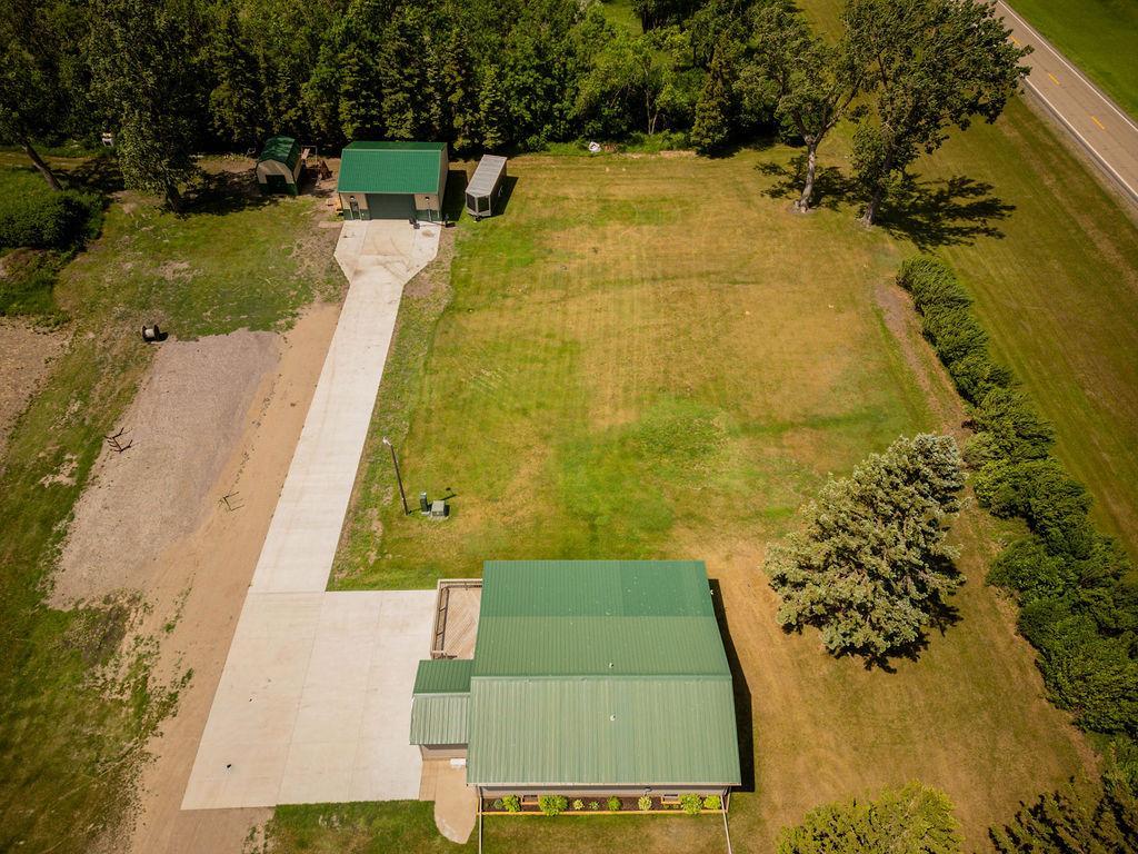 drone looking west w/front yard area