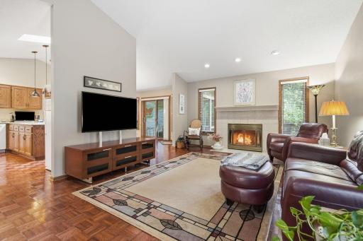 Enjoy an airy open-concept design with vaulted ceilings and an abundance of natural light throughout.â