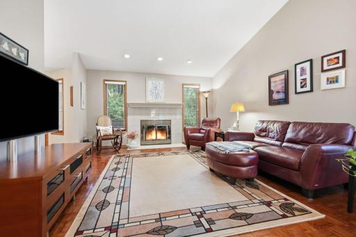 Meticulously maintained, this home offers a versatile fireplace that can be enjoyed as either gas or wood-burning.