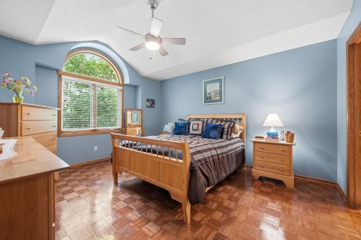 The spacious primary bedroom features a large walk-in closet and large primary bathroom