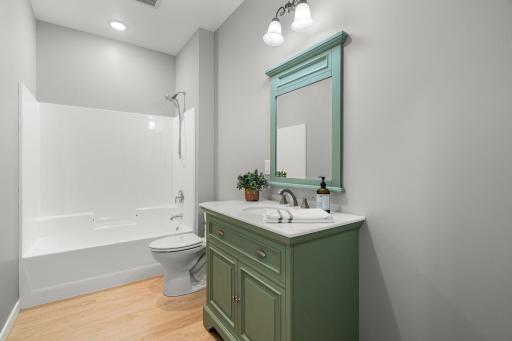 Full second bathroom with granite countertop vanity